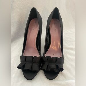 Beautiful Black satin Tahari heels, normal wear. Very comfortable